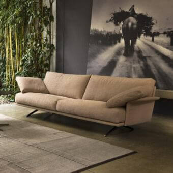 Distinguished Verzelloni Nilson sofa with curved armrests upholstered in textured light brown textile for designer living rooms