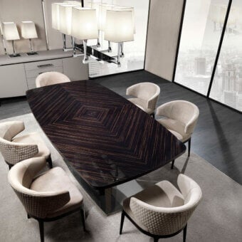 Elegant DV Home Collection Windsor table with Cacao Walnut veneered top and glossy radiating lines built with a stainless steel pedestal base