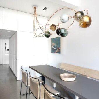 Captivating Bocci 28 Copper suspension lamp built with a dynamic orbital framework in natural copper and glass shades