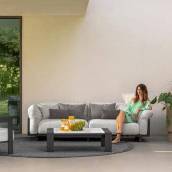 Sophisticated Talenti Argo Alu sofa with a powder-coated aluminum frame and stylish elastic straps woven with light gray weather-resistant fabric cushions