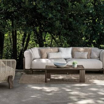 Elegant Talenti Argo Wood sofa with dark brown wood frame and light beige textile cushions for a sculpted seat
