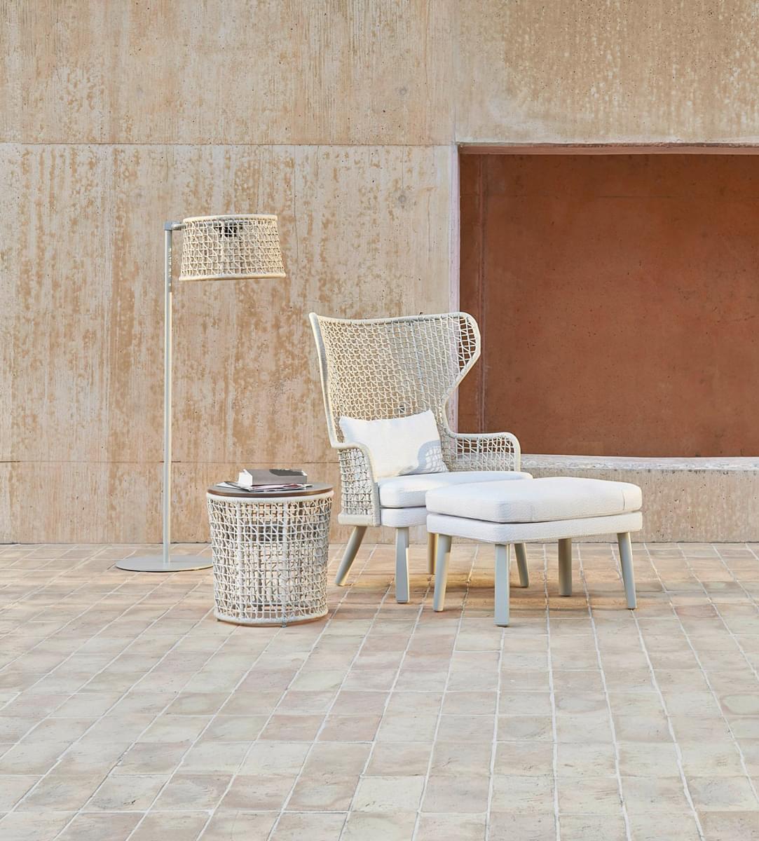 Distinguished Varaschin Emma floor lamp with a light cream woven cylindrical shade and light gray powder coated aluminum frame