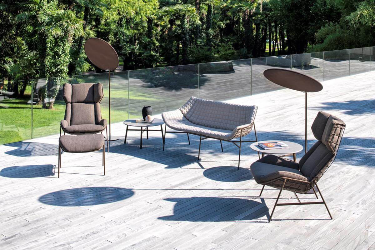 Distinguished Varaschin Emma sunshade with matte brown metal and micro-perforated technical PVC fabric filtering sunlight