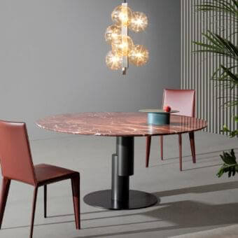 Distinguished Bonaldo Innesti table with reddish-brown marble top and dark metal base in a matte finish