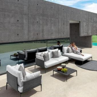 Innovative Talenti Leaf coffee table with square form and dark-toned matte vitter top built with an aluminum base