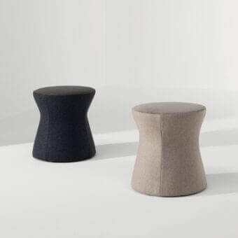 Elegant Bonaldo Clessidra ottoman with light brown textile upholstery and a light gray top surface