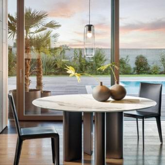 Innovative Bonaldo Geometric table with a marbled white and grey top and painted aluminum teardrop-shaped legs