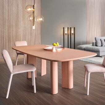 Exceptional Bonaldo Geometric table crafted in Italy with a hand spatulated clay finish in dusty rose or terracotta hues