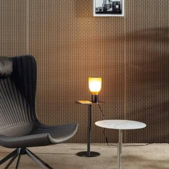 Impeccable Bonaldo Innesti side table with round ceramic top in marble-like finish and slender brushed light-gray metal base