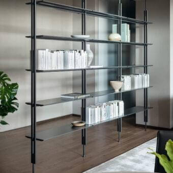 Distinguished Bonaldo Roll bookcase with black metal poles supporting dark grey metal shelves creates a minimalist framework