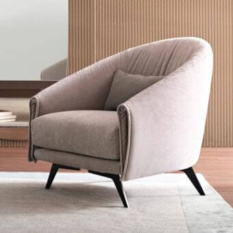 Elegant Bonaldo Saddle lounge chair with light grayish-beige textile upholstery and black matte metal legs crafted with leather accents