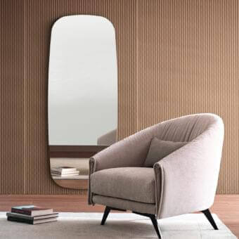 Captivating Bonaldo Saddle lounge chair with light grayish-beige textile upholstery and matte painted metal legs crafted with leather inserts