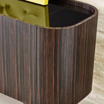 Distinguished Rugiano Frak sideboard with ebony structure and brass feet exhibiting a glossy dark brown finish and dark top surface