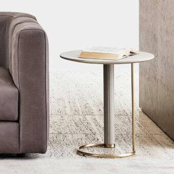 Distinctive Rugiano Opale side table with light gray stone tabletop and brushed brass base crafted in Italian design