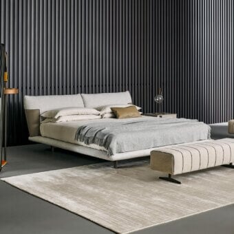 Distinguished Bonaldo Blend bed with light beige removable fabric upholstery and darker beige emery leather inserts crafted with matt painted metal feet