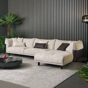 Distinguished Bonaldo Blend sectional with a wood structure covered in emery leather and light fabric upholstery crafted with matt painted metal feet