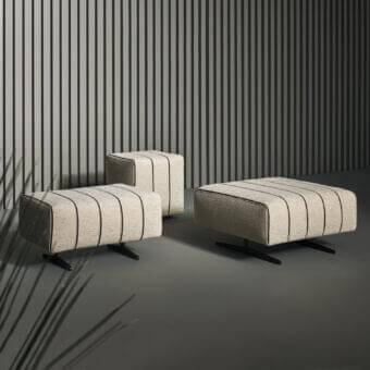 Refined Bonaldo Mark ottoman with light beige textured textile and subtle striped pattern, crafted in Italy with leather details and black feet