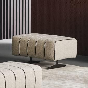 Distinguished Bonaldo Mark ottoman with light beige textured fabric and precious black leather inserts, built with a dark metal base