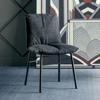 Distinguished Bonaldo Pil chair with dark gray upholstery and a metal frame exhibiting crossbar detailing