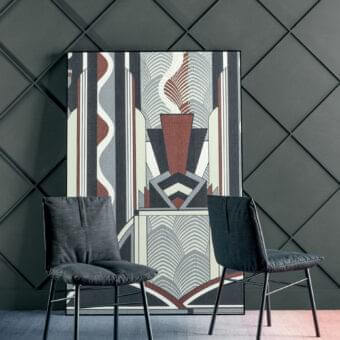 Exceptional Bonaldo Pil chair with dark gray textile upholstery and slender black metal legs