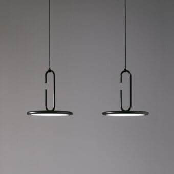 Elegant Penta Clip suspension lamp with refined metal structure and matte black finish for overhead illumination