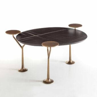 Distinguished Rugiano Bonsai coffee table with oval stone-like top and hammered bronze base, showcasing a matte finish
