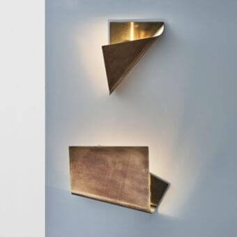 Exceptional Rugiano Leaf wall lamp crafted in Italy with warm brass tones and a captivating matte glossy finish