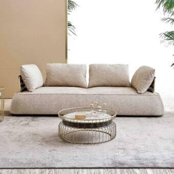 Refined Rugiano Melody sofa with woven light beige textile and metal backrests offering unparalleled comfort