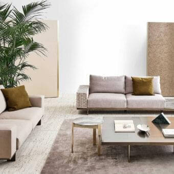 Distinguished Rugiano Memphis sofa with light beige fabric upholstery and linear metal base crafted in Italy