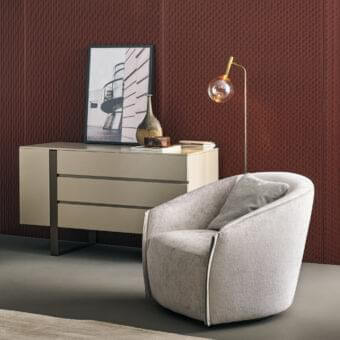 Refined Bonaldo Bodo lounge chair with light gray textured fabric upholstery and metallic trim built with a matt painted metal swivel base