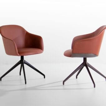 Captivating Potocco Lyz chair with sinuous lines fully upholstered in reddish-brown leather and dark metal base