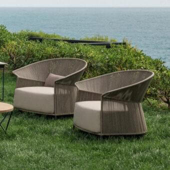 Sophisticated Potocco Ola lounge chair with hand-woven gray-brown ribbon backrest and plush light beige polyurethane foam cushion