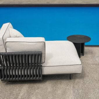 Superior Potocco Soul lounger, outdoor seating with interwoven backrest and dark woven frame supporting light grey cushions