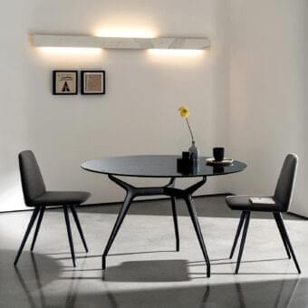 Elegant Sovet Italia Arkos table with glossy black tabletop and matte black die-cast aluminum base crafted in Italy
