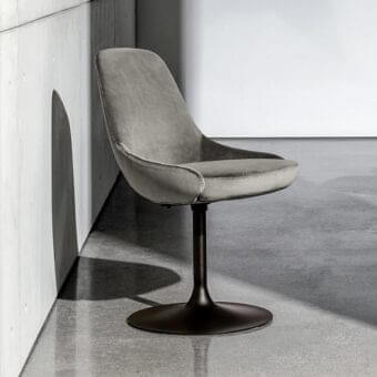 Distinguished Sovet Italia Cadira swivel chair with medium gray textile upholstery and embossed black lacquered metal base