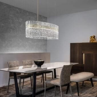 Distinguished Masiero Vegas Ovale suspension lamp with rock-effect glass strips and gold-finished metal elements in a contemporary design