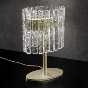 Elegant Masiero Vegas table lamp with clear rock-effect glass strips and champagne gold-toned metal structure