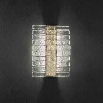 Exclusive Masiero Vegas wall lamp with metal structure and clear rock-effect glass strips accented by amber-toned glass