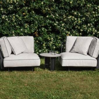 Distinguished Potocco Soul lounge chair with an interweaving backrest and dark-toned platform built with metal and light-colored cushions
