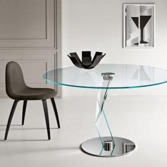 Distinguished Tonelli Design Bakkarat table with extra clear glass top and sculptural intertwined glass base in chrome-plated metal