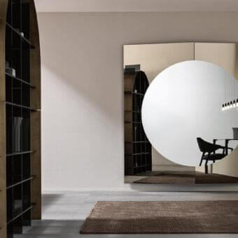 Refined Tonelli Design Central mirror with geometric panels and reflective silver surfaces in a light tan frame