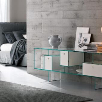 Distinguished Tonelli Design Liber sideboard with transparent glass structure and matt white lacquered wood drawers