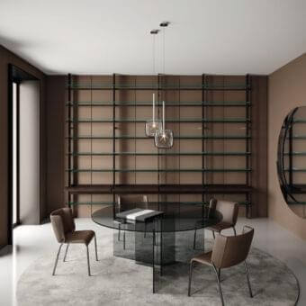 Distinguished Tonelli Design Thrim table with a round glass top and uniquely angled dark-toned base representing Italian glass manufacturing