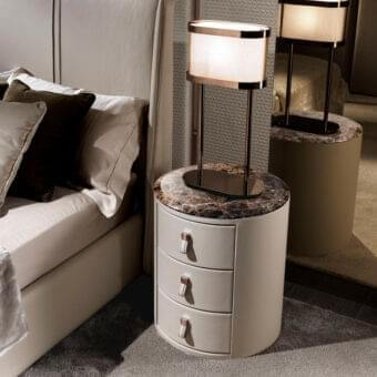 Exceptional DV Home Collection Adler Plus nightstand crafted with light beige leatherette and a marble-like top with polished metallic handles