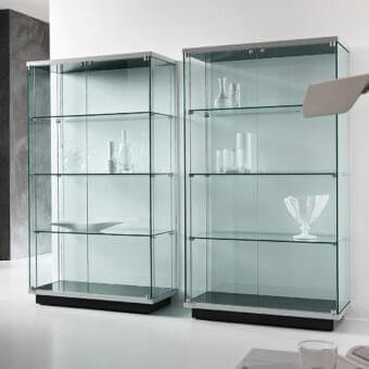Elegant Tonelli Design Broadway showcase crafted in transparent tempered glass with black lacquered wood and matte silver frame