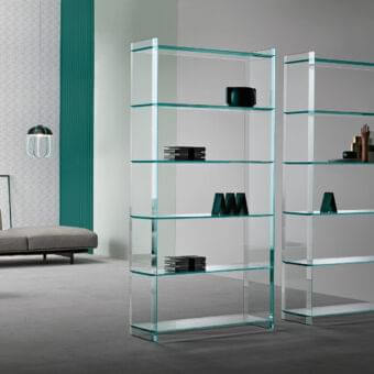 Elegant Tonelli Design Quiller bookcase crafted in extra clear glass with stylish bevelings for bright display