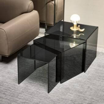 Distinguished Tonelli Design Trio side table in smoked glass with glossy finish exudes contemporary sophistication