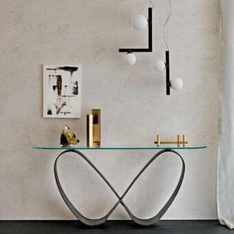 Exceptional Cattelan Italia Butterfly console with clear glass top and titanium embossed lacquered steel base in a dark matte finish