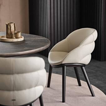 Distinguished Cattelan Italia Camilla armchair with light beige fabric upholstery and matte finish wooden base