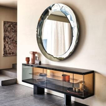Distinguished Cattelan Italia Cosmos mirror with fumé mirrored glass and organically shaped portions exhibiting a bush-hammered finish